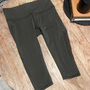 Hunter green crop lululemon leggings in size 4